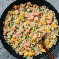 Shrimp fried rice is a simple and classic dish that always hits the spot. The crispy rice and juicy shrimp are cooked with simple seasonings and aromatics, bringing out the clean flavor of the shrimp. Whether you’re looking for a comforting weeknight meal or a crowd-pleasing dish, this recipe is a surefire hit. {Gluten-Free Adaptable}