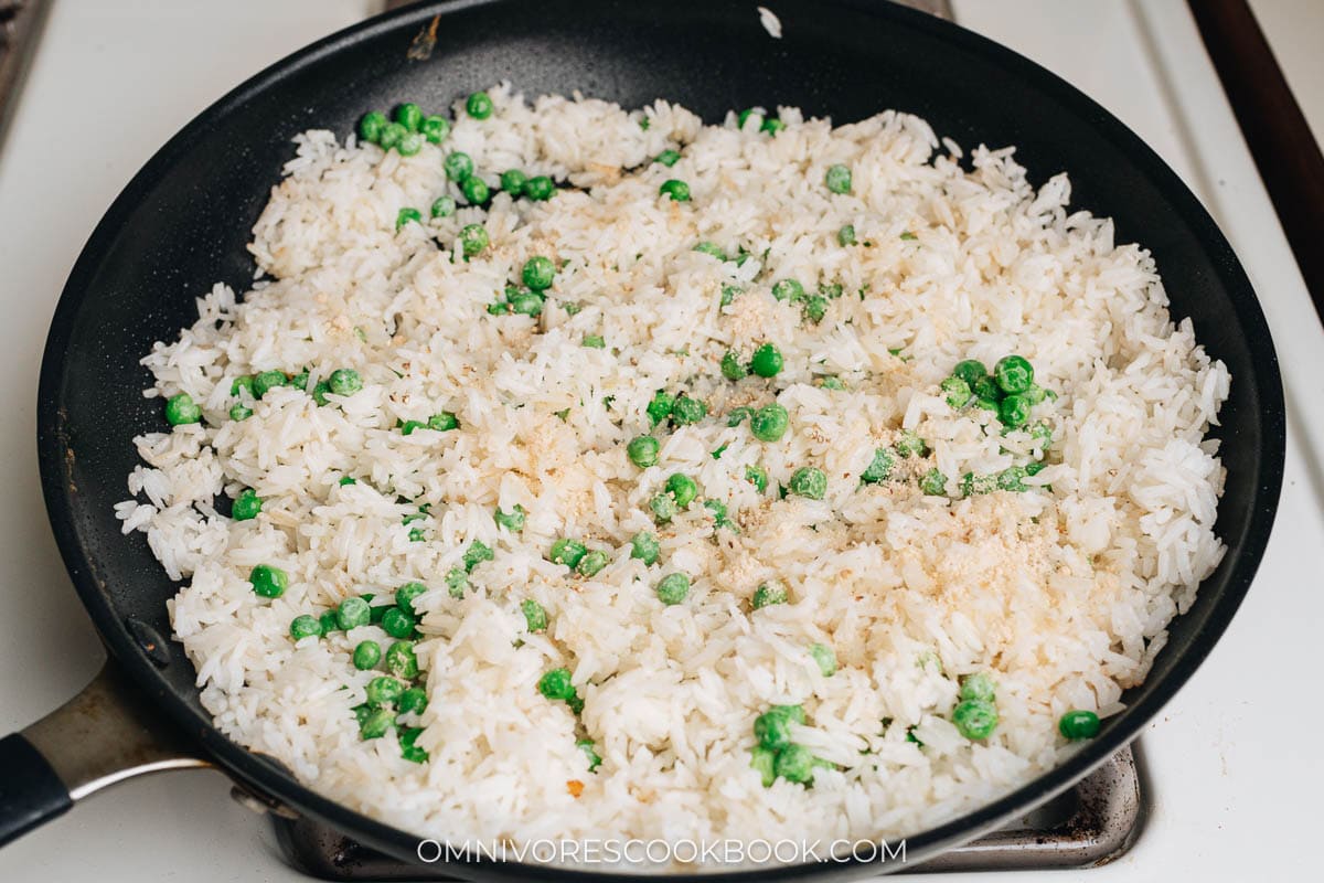 Toasting rice with green peas