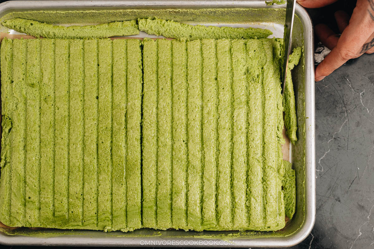 Trim off the edges of matcha cake