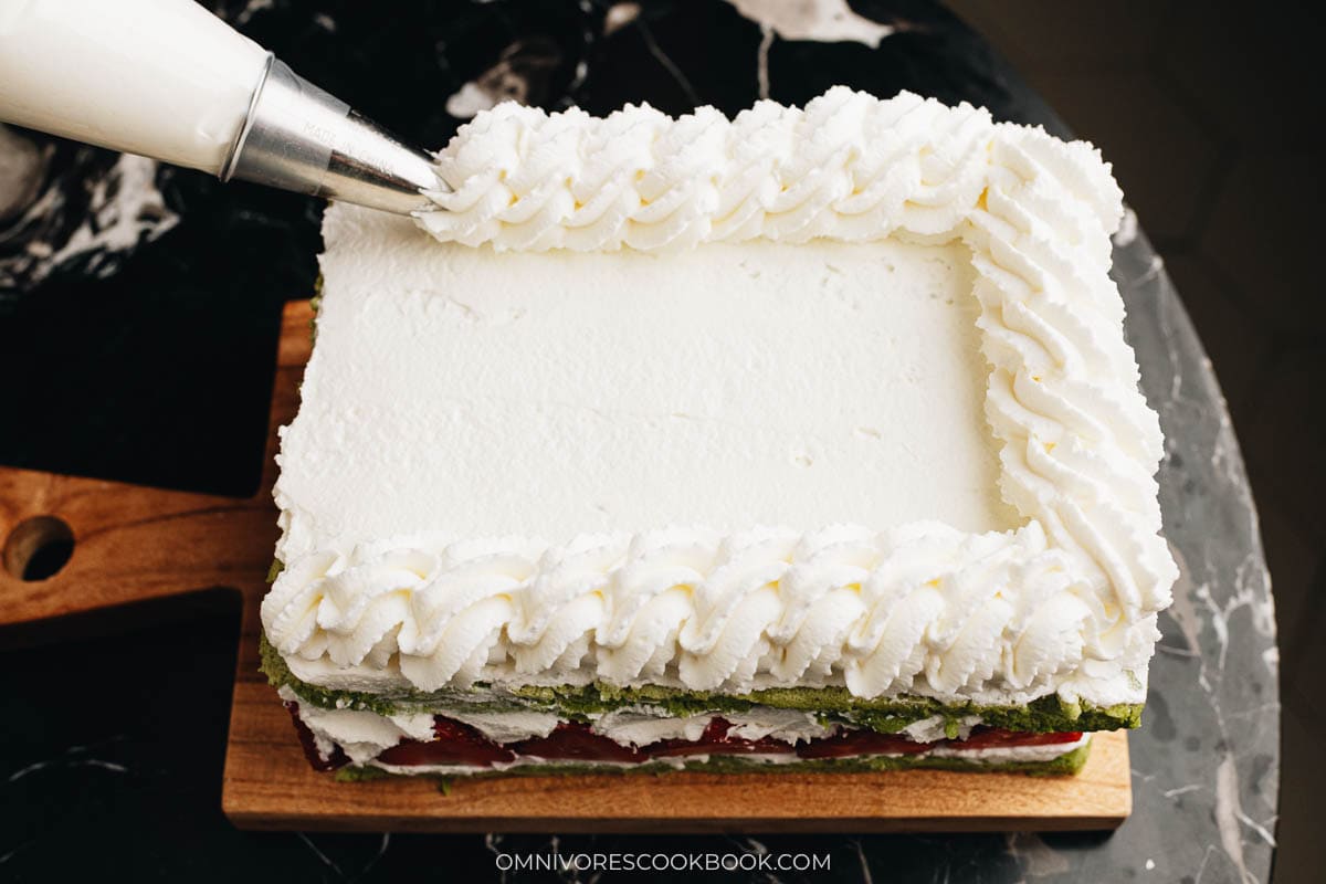 Frosting the matcha cake