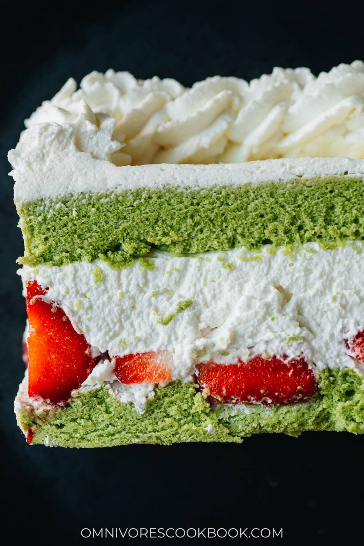 Japanese matcha cake slice served on a plate close up