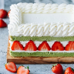 A matcha cake recipe that creates feathery light and moist cake, with an earthy matcha flavor balanced with strawberries and whipped cream that are not too sweet. The cake stores well, can be prepared ahead, and holds up well during transportation, making it perfect for your next holiday gathering. {Vegetarian}