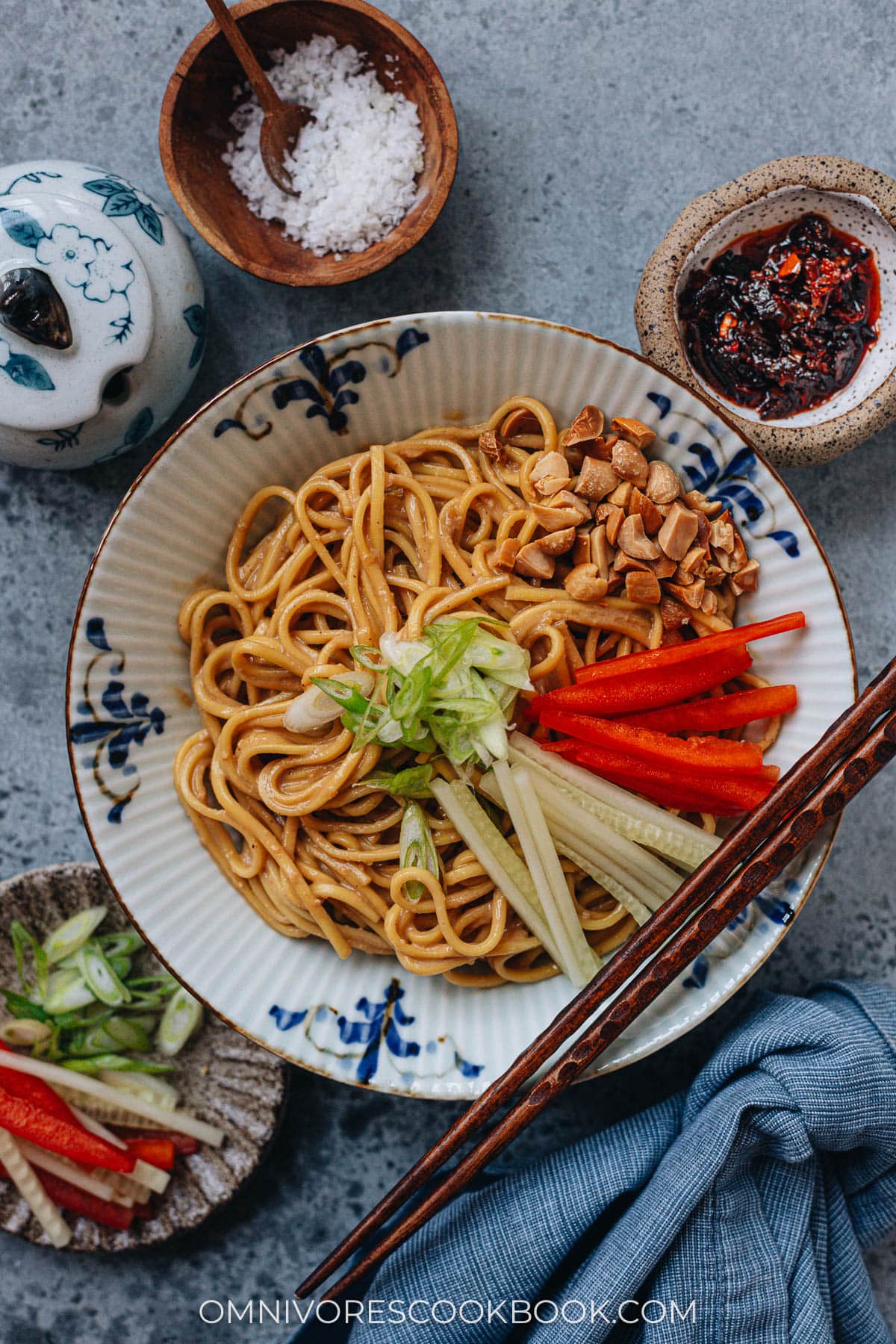 Homemade peanut noodles topped with cucumber and pepper