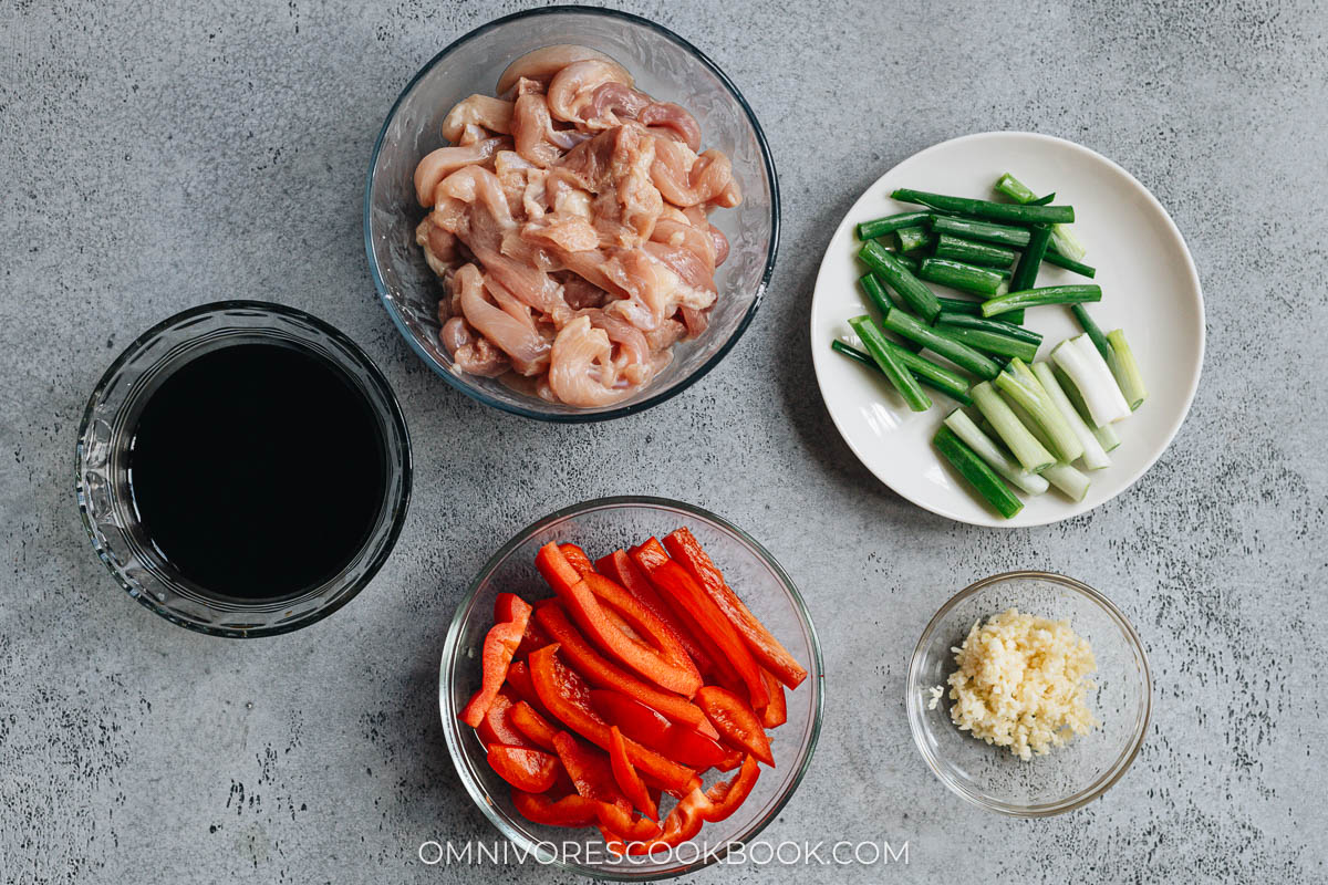 Ingredients for making chicken with garlic sauce in a pan