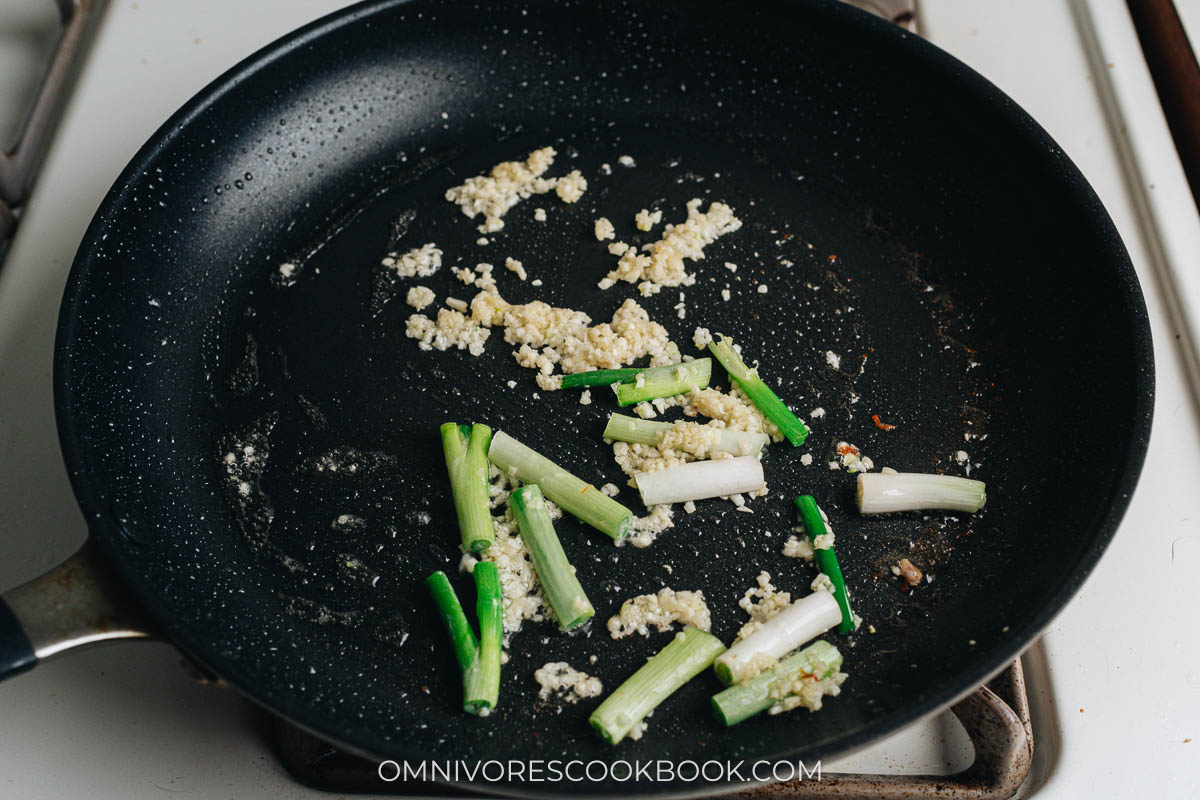 Saute garlic and green onion