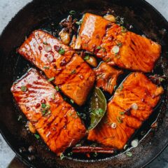 A simple yet rich tasting honey glazed salmon that features moist, tender salmon glazed with a balanced sauce that is savory, sweet, and bursting with aroma.