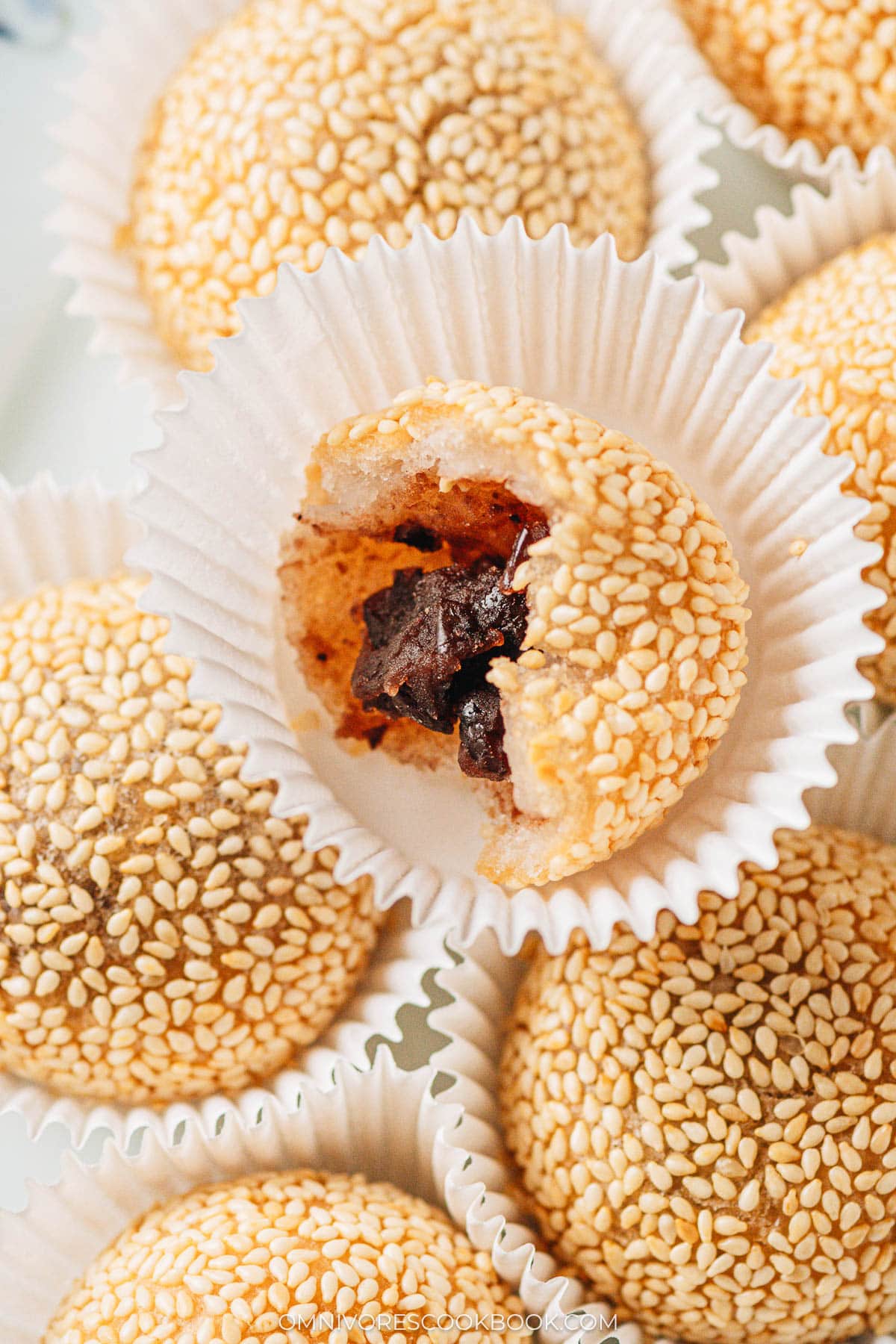 Opened sesame ball filled with red bean filling