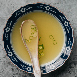 Chinese chicken stock served in a soup bowl