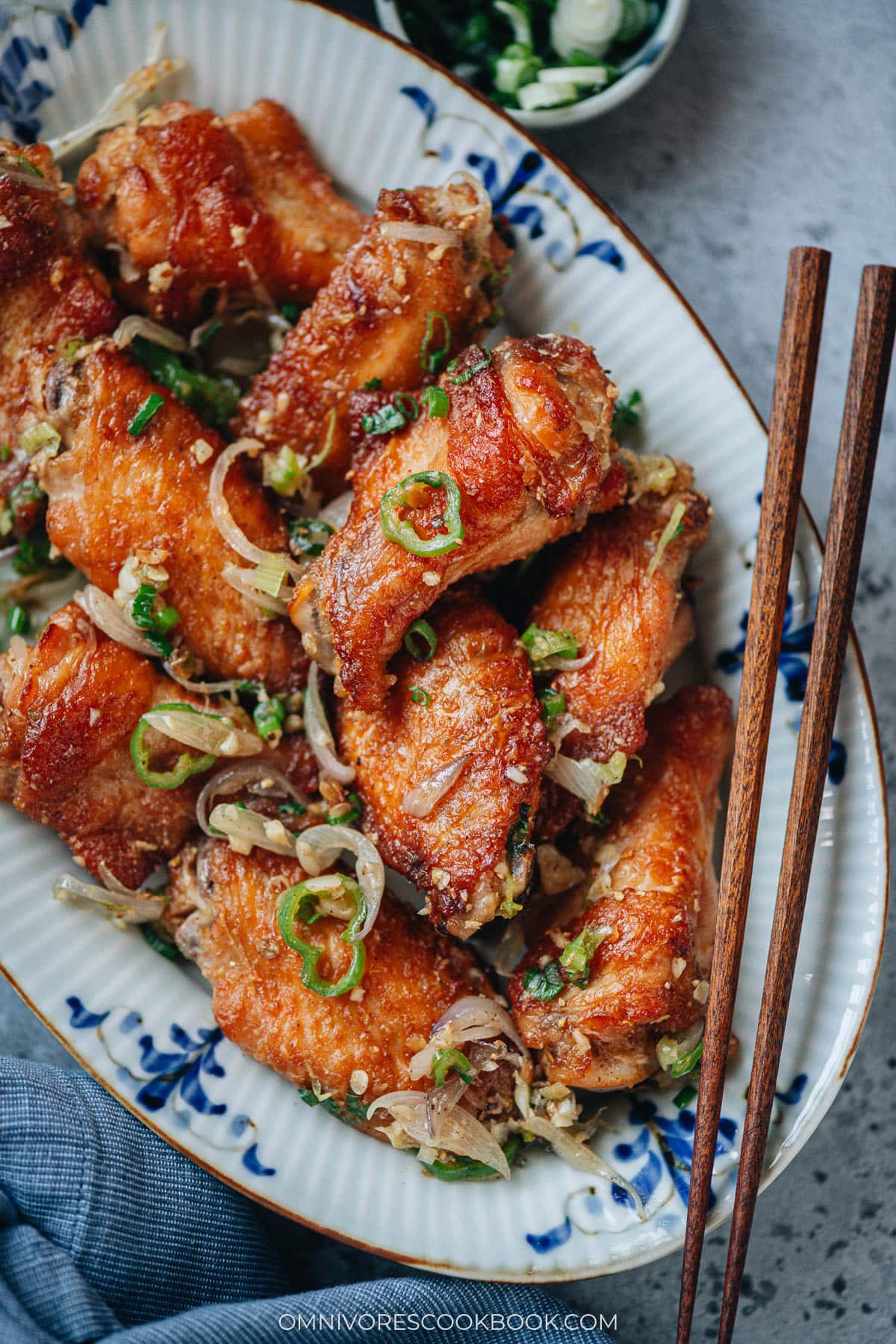 Salt and pepper chicken wings served in a platter