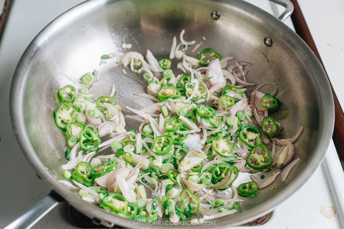 Stir fry the aromatics in a large skillet