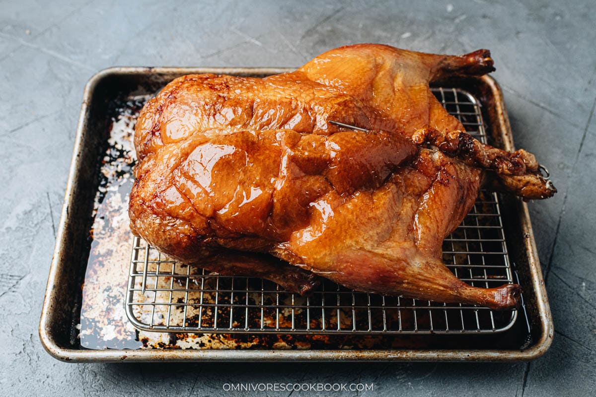 Whole Chinese roast duck on a tray