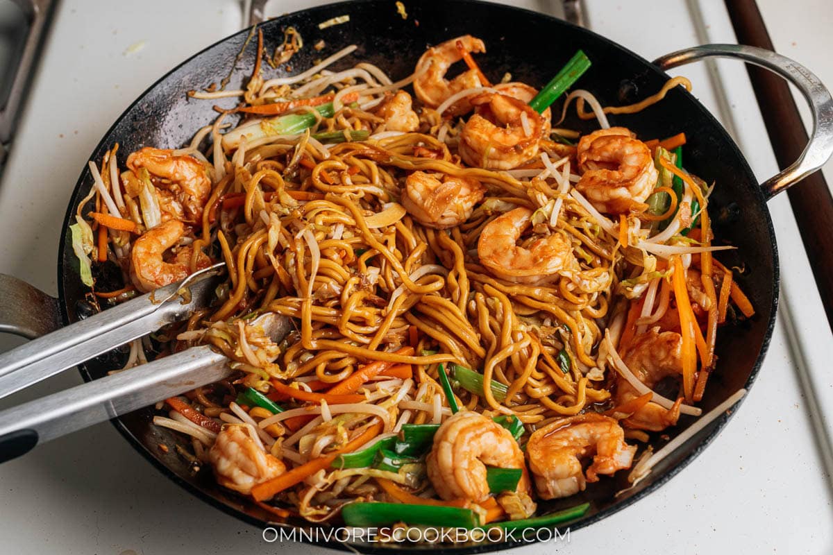 Toss the shrimp lo mein to finish up