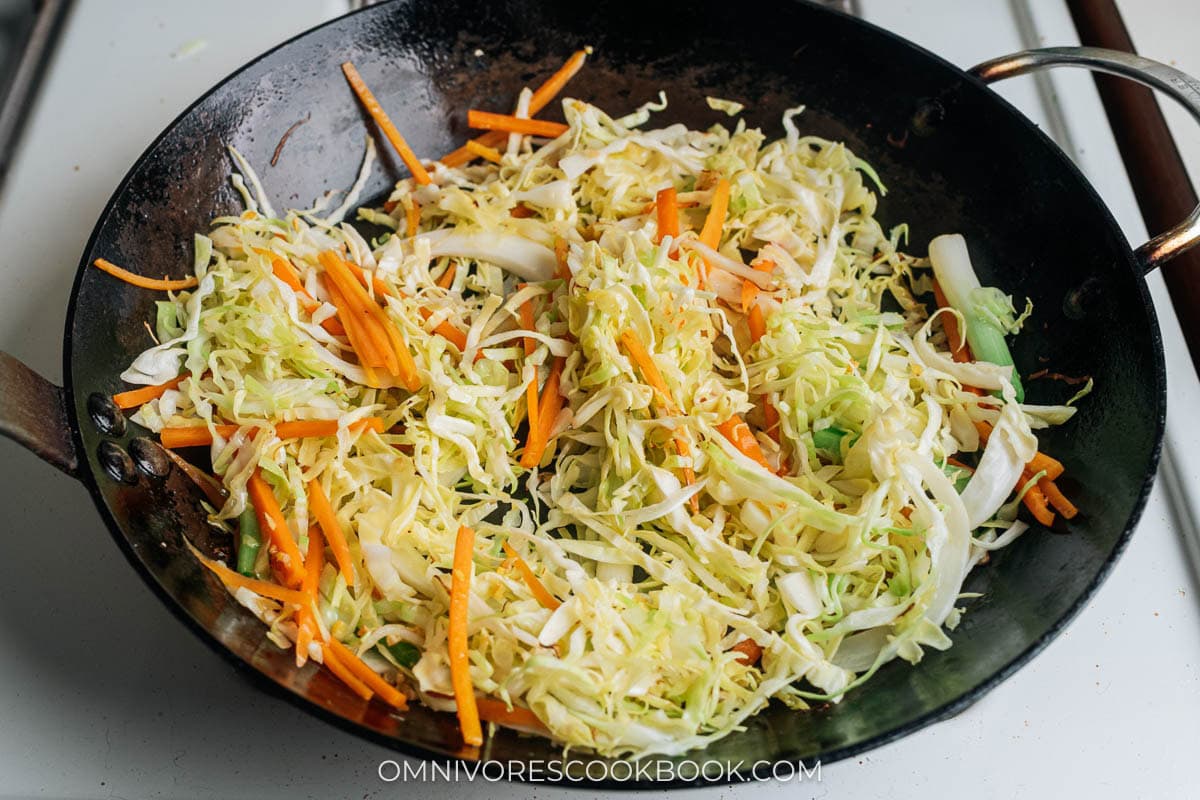 Cook the carrot and cabbage