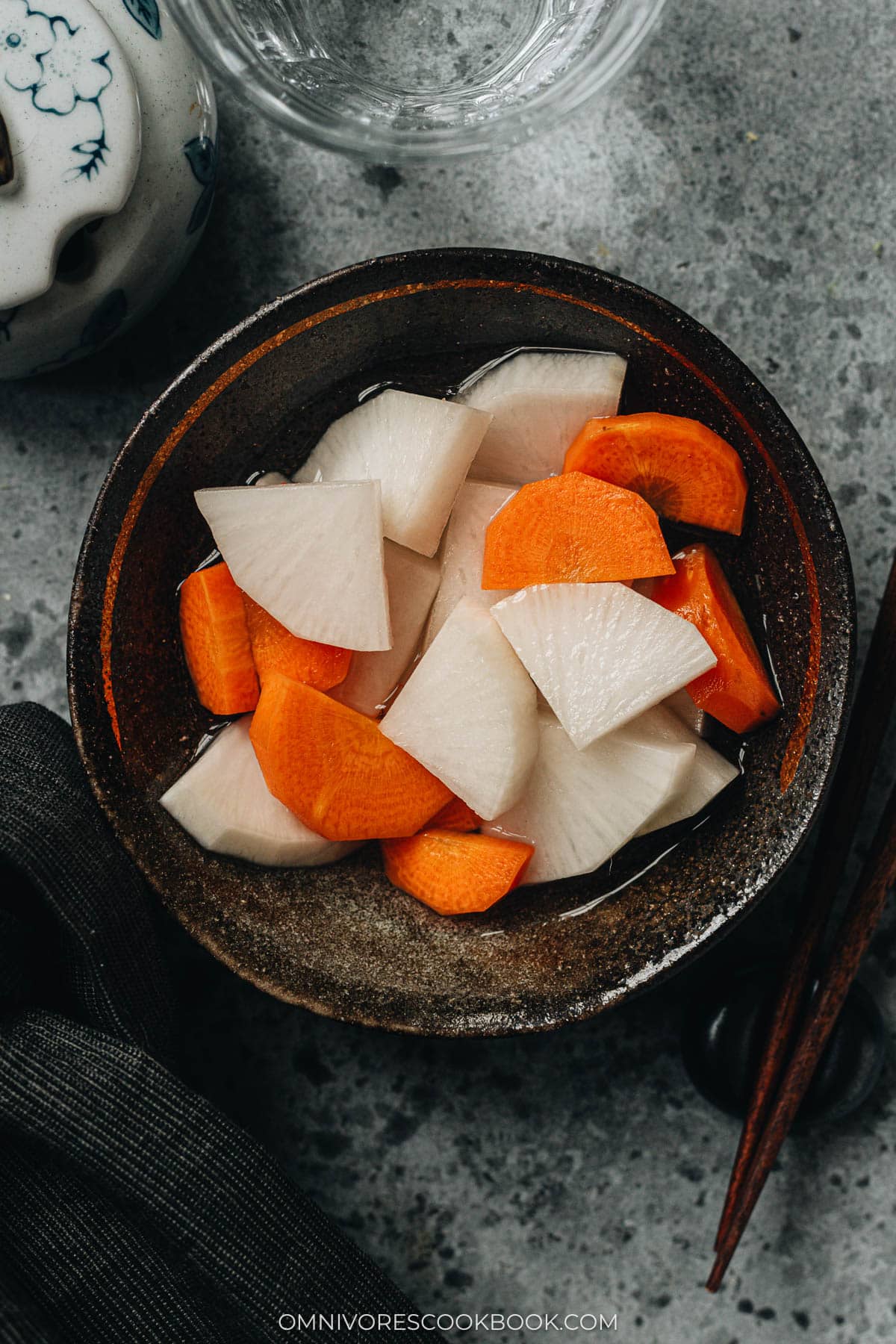 Pickled daikon served in a small bowl