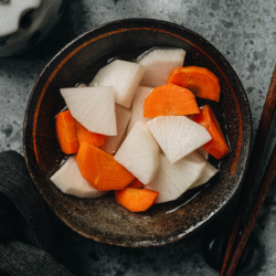 Make this tangy and crunchy pickled daikon and carrot to pique your appetite and start your meal. It’s a quick pickle recipe that takes no time to put together. {Gluten-Free, Vegan}