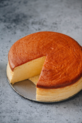 Japanese cheesecake with one slice removed