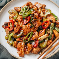 An authentic tasting Hunan chicken that features tender chicken pieces and hot peppers cooked in a rich savory sauce made with fermented black beans and aromatics. If you enjoy a takeout style Hunan chicken, as well as spicy food with a punch, you can’t miss this one. {Gluten-Free Adaptable}