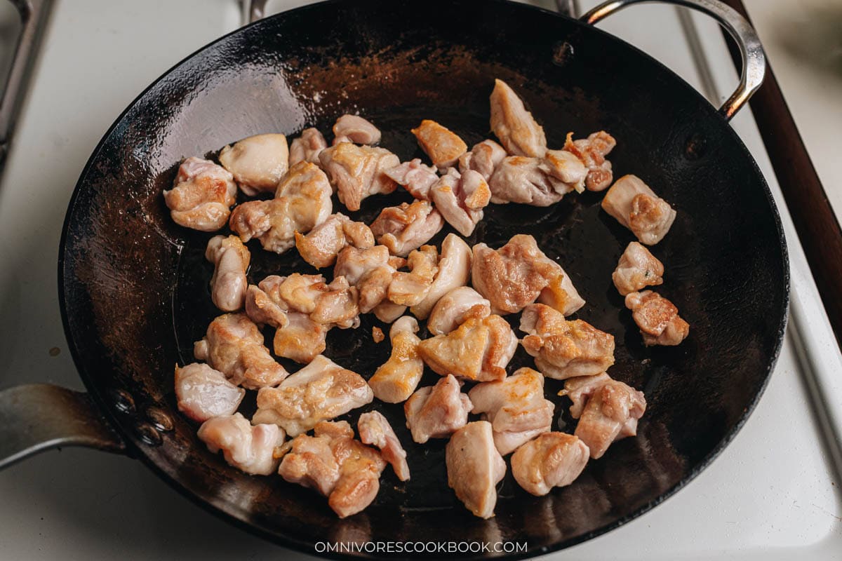 Sear chicken in a pan