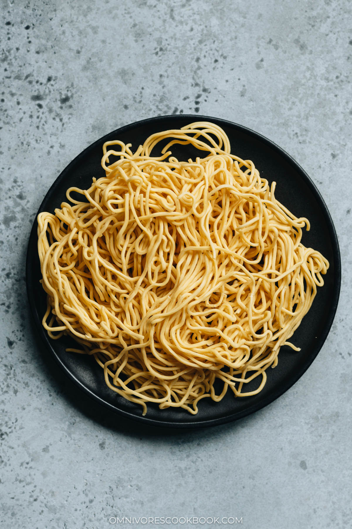 Uncooked chow mein noodles in a plate