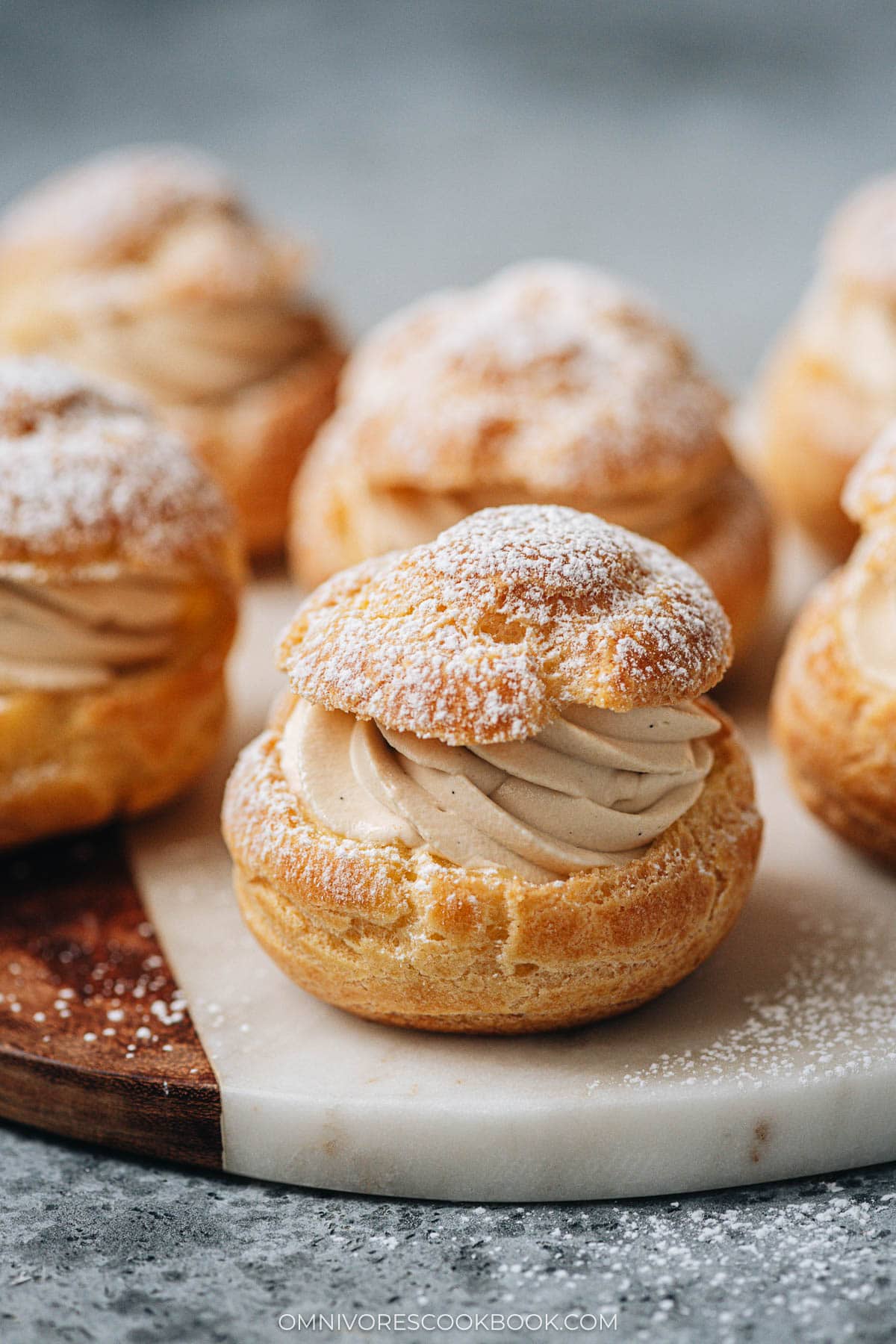 Choux pastry with milk tea cream close up