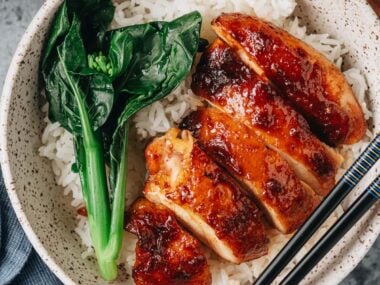 Homemade char siu chicken over rice with gai lan