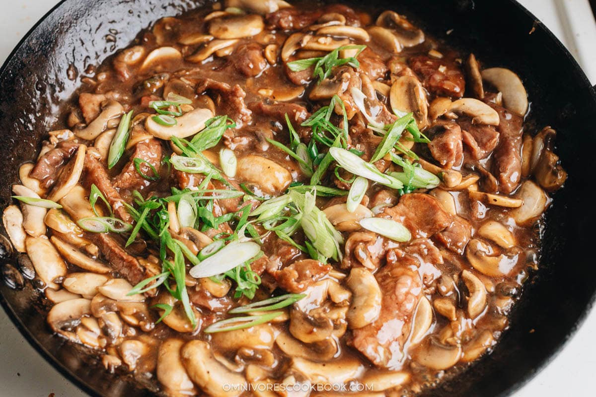 Finish up the dish by adding sauce and scallion