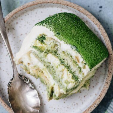 Serving matcha tiramisu on a plate