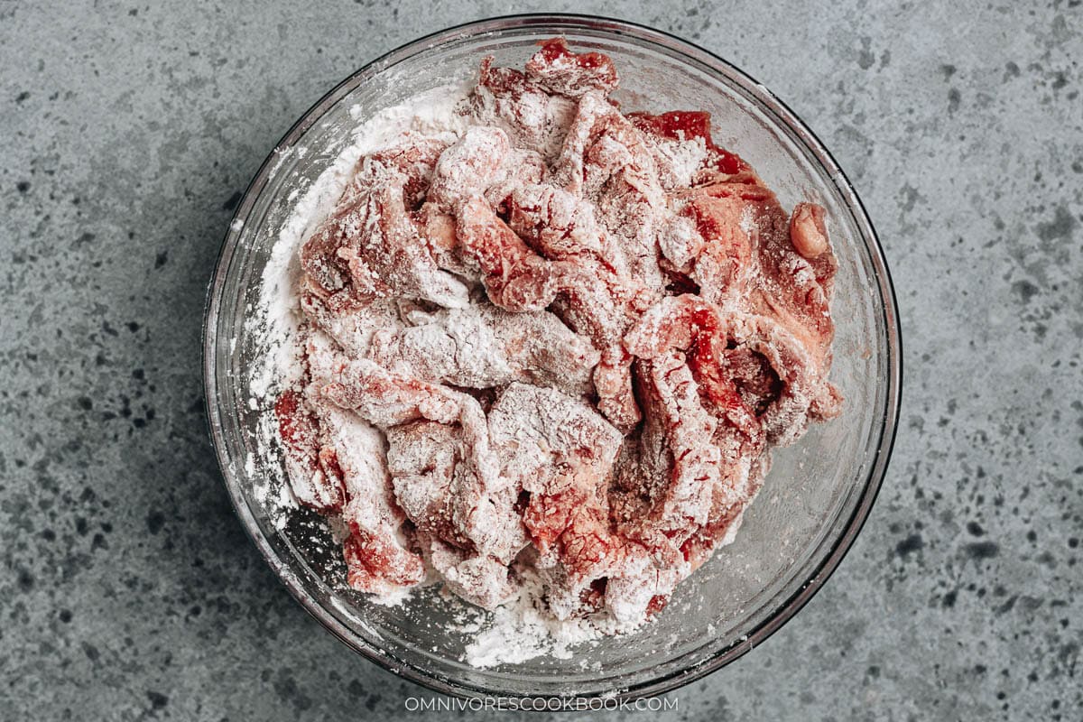 Marinate the beef and coat with cornstarch