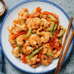 Cashew shrimp is a fast and flavorful stir-fry that combines juicy shrimp, crunchy cashews, and crisp vegetables in a light yet aromatic white sauce.