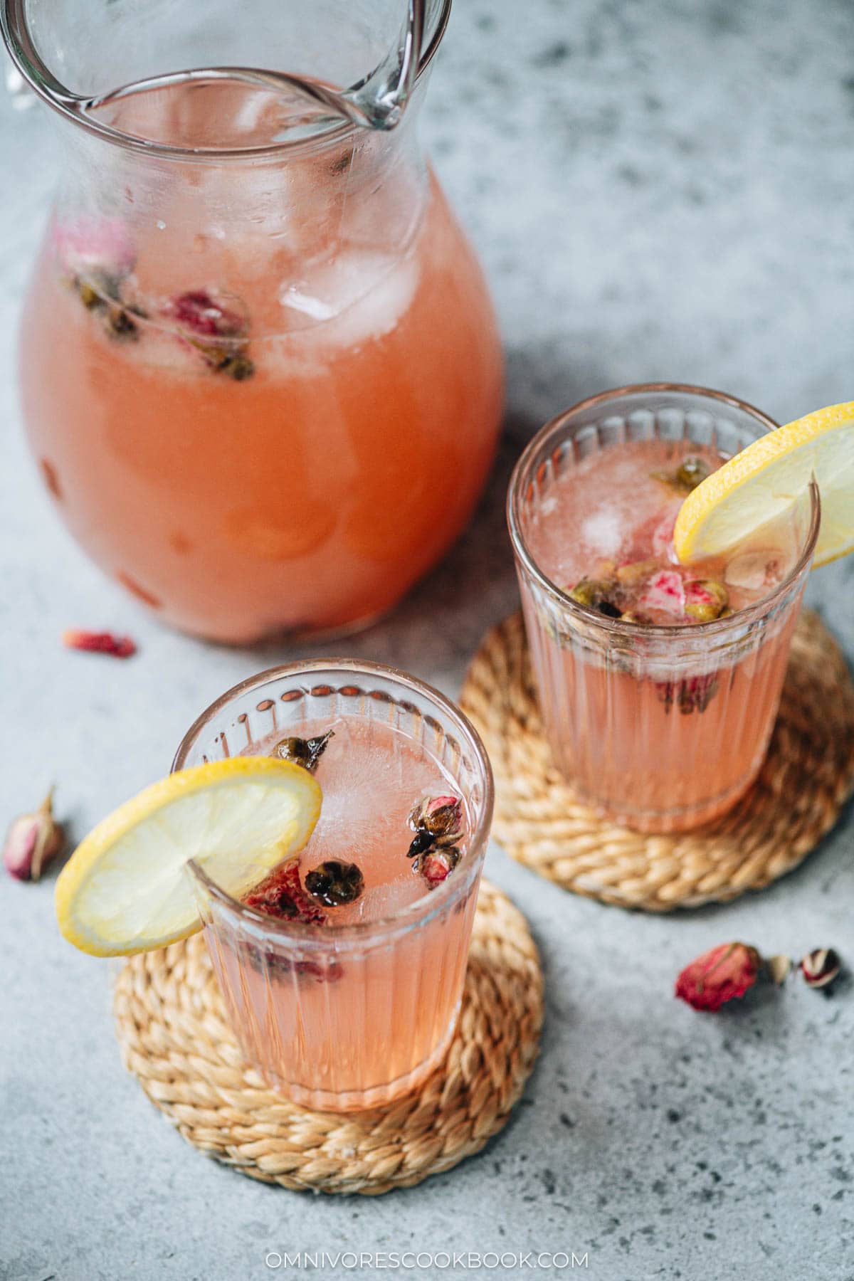 Glasses of rose lemonade and a jug in the back