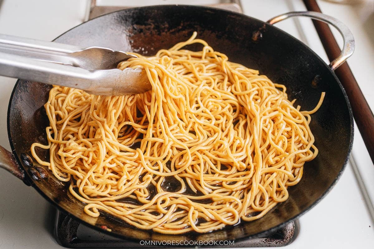 Toss the lo mein with sauce