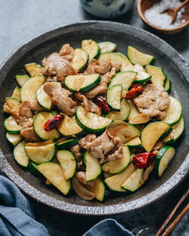 Chinese zucchini and pork stir fry served in a plate