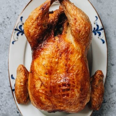 Air fryer Chinese roast whole chicken served on a plate