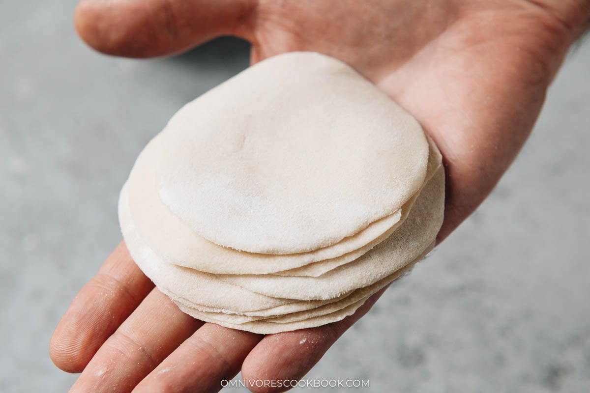 A stack of homemade dumpling wrappers