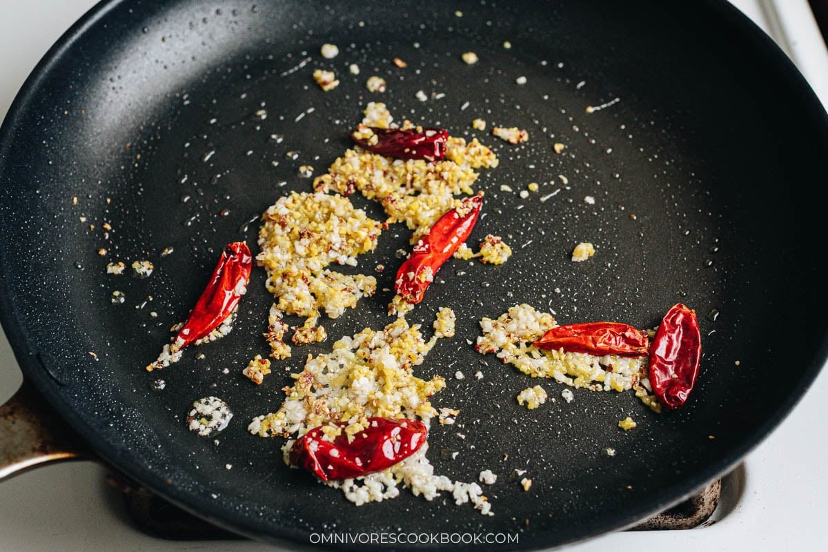 Cook aromatics and spices