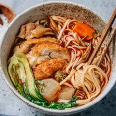 This Chinese spicy chicken noodle soup features juicy braised chicken, tender vegetables and chewy noodles in a spicy and savory broth. It has the comfort of homemade chicken noodle soup but with the bold, complex flavors of Sichuan cooking.