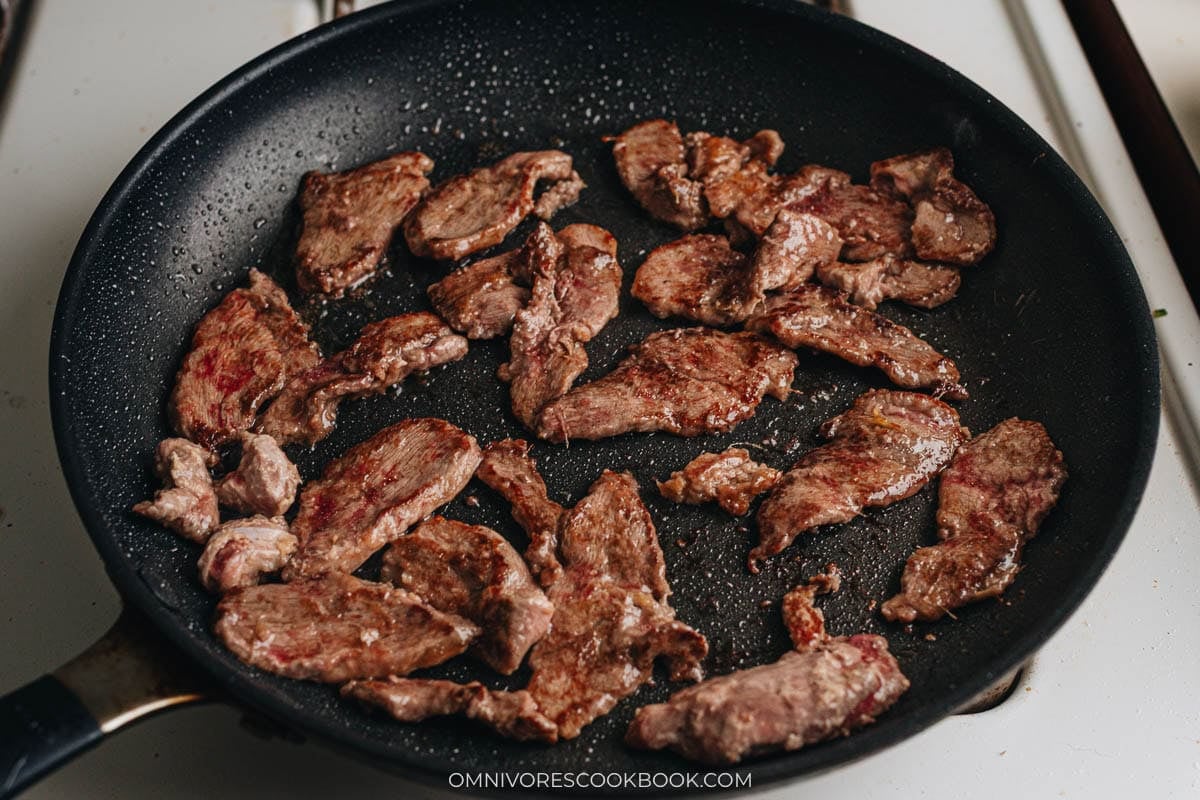 Sear duck slices in a pan