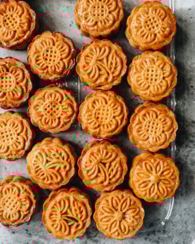 Homemade traditional Cantonese mooncakes in a baking dish