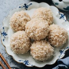 Chinese pearl balls is a dish I’ve enjoyed since childhood, featuring tender flavorful juicy pork meatballs coated with tender sticky rice. They are fun to make, freezer-friendly, and look impressive, making them perfect for Sunday dinner and Chinese New Year.
