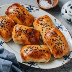Chinese baked buns, or Kao Bao Zi, are one of my favorite dishes to make on the weekend. Stuffed with lamb and onion, seasoned with cumin and black pepper, the buns are baked until golden crispy. They look impressive and are so comforting to eat, a perfect snack or light meal by itself.