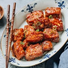 My Peking ribs recipe teaches you a fast way to create super flavorful pork ribs that are crispy on the outside, juicy inside, and coated with a glossy sweet and sour sauce.