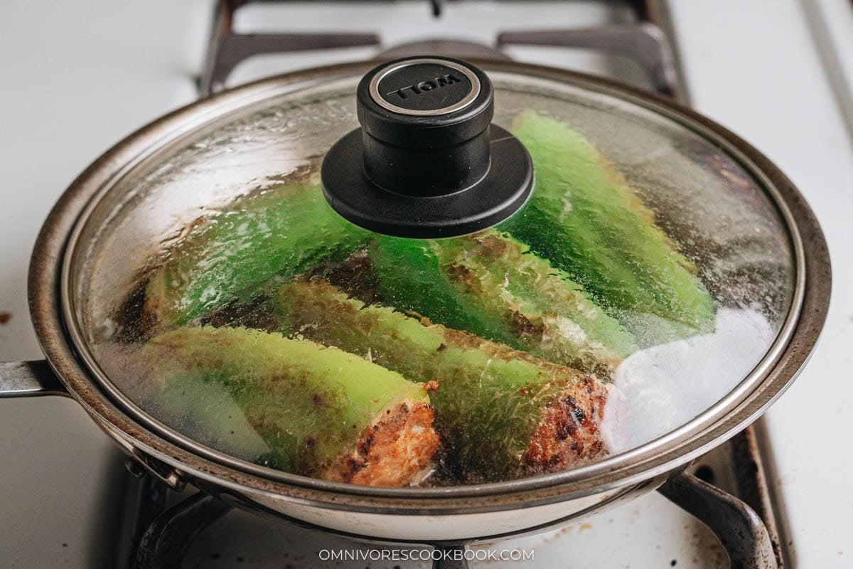 Cover to braise the peppers