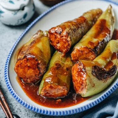 Chinese stuffed peppers served in a plate close up