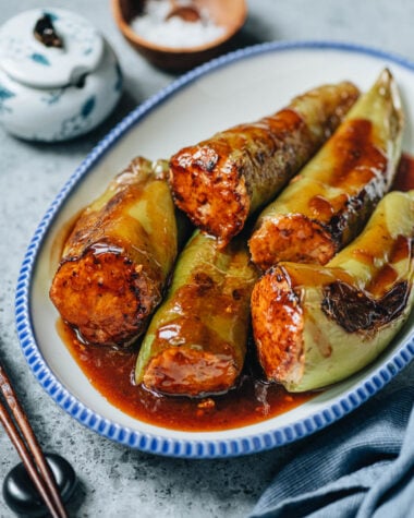 Chinese stuffed peppers served in a plate close up