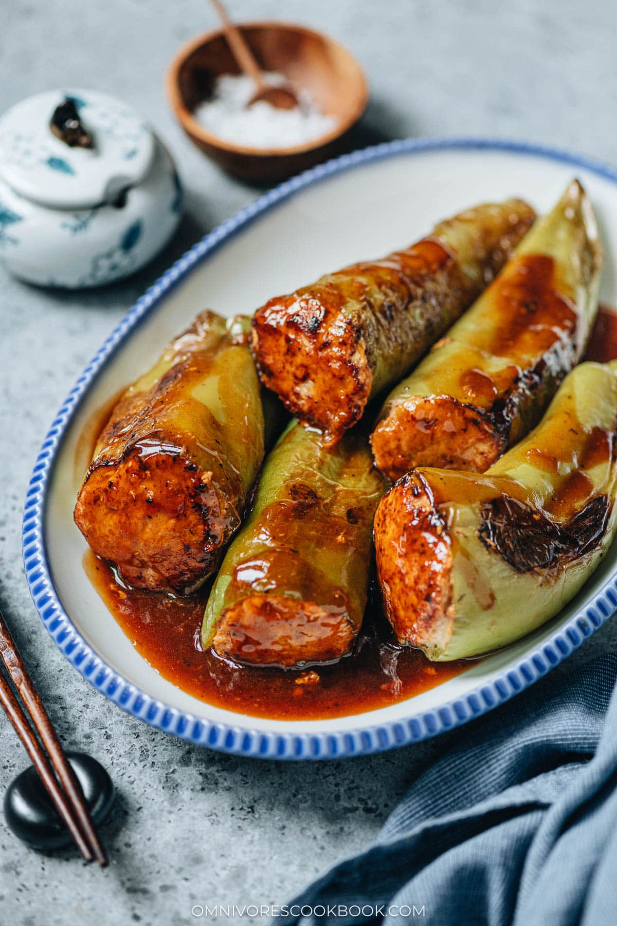 Chinese stuffed peppers served in a plate close up
