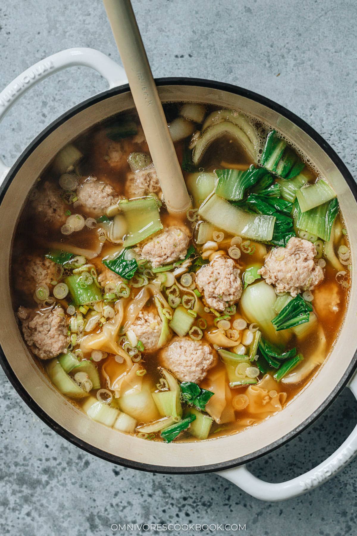 Homemade deconstructed wonton soup in a pot