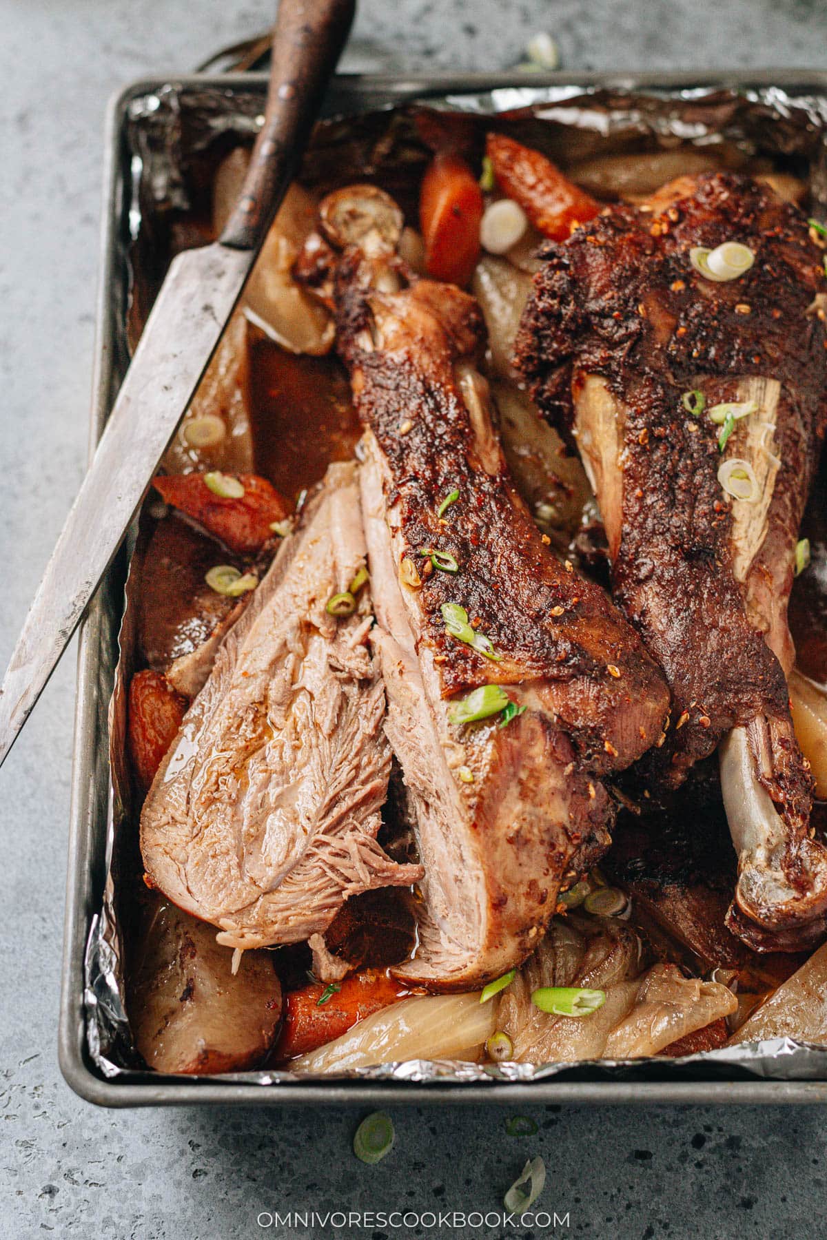 turkey leg cut over vegetables