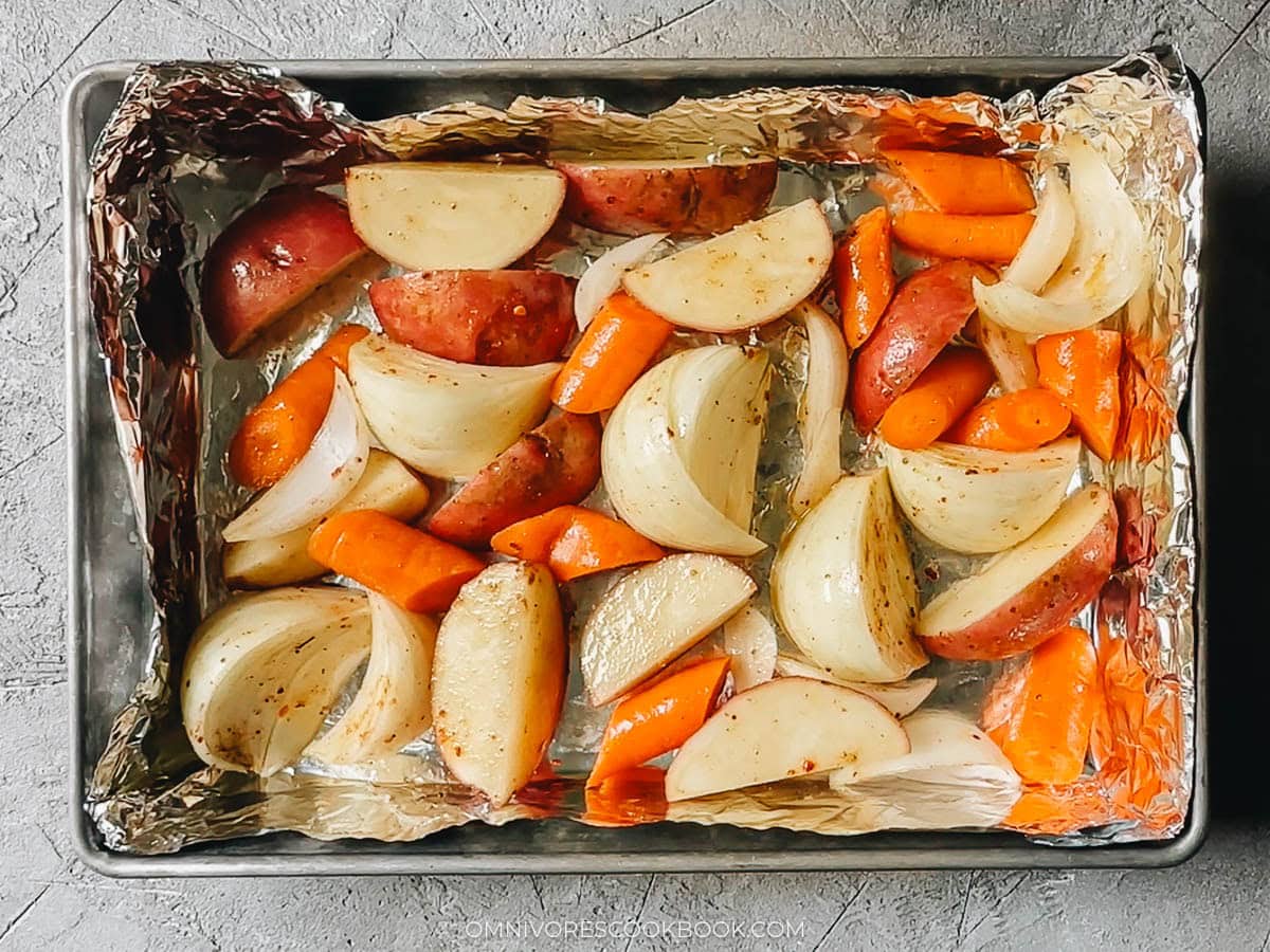 Spread the vegetables in a foil-lined baking pan