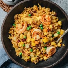 My Thai pineapple fried rice uses simple ingredients to create maximum flavor. By using tangy fresh pineapple, sweet shrimp, and curry powder to add complexity, this fried rice is packed with flavor and texture that you can’t resist.