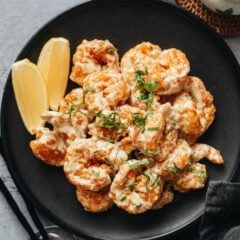 Wasabi mayo shrimp is a great appetizer to spice up your dinner party. Juicy shrimp are lightly battered and fried until crisp, then tossed in a creamy Kewpie mayo-wasabi sauce with a touch of lemon. It’s bold yet elegant, the kind of dish that feels restaurant-level, but with the comfort and freshness of homemade.
